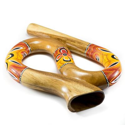 Cestovné didgeridoo esovitého tvaru v červeno-žltom prevedení